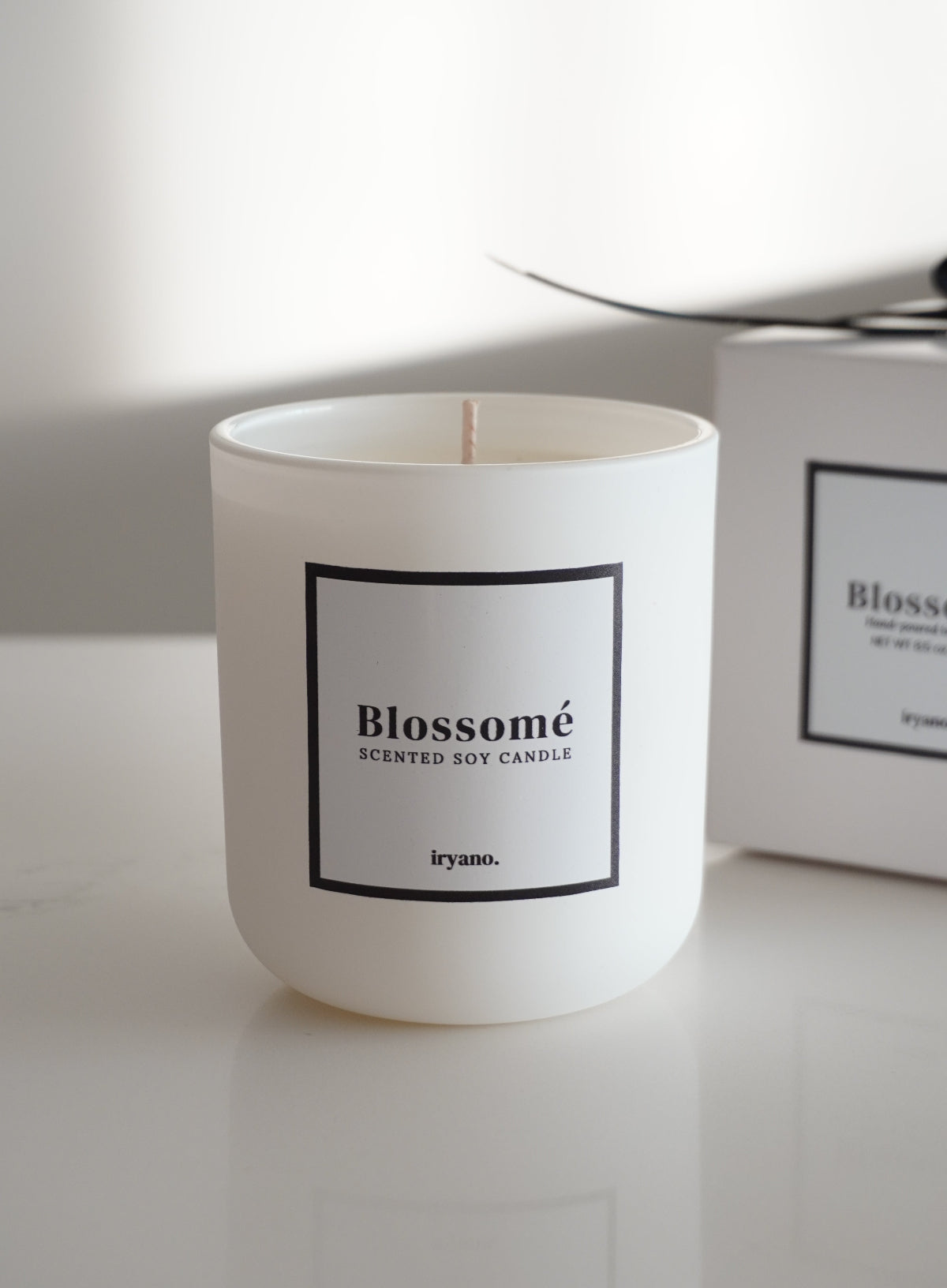 White candle with box