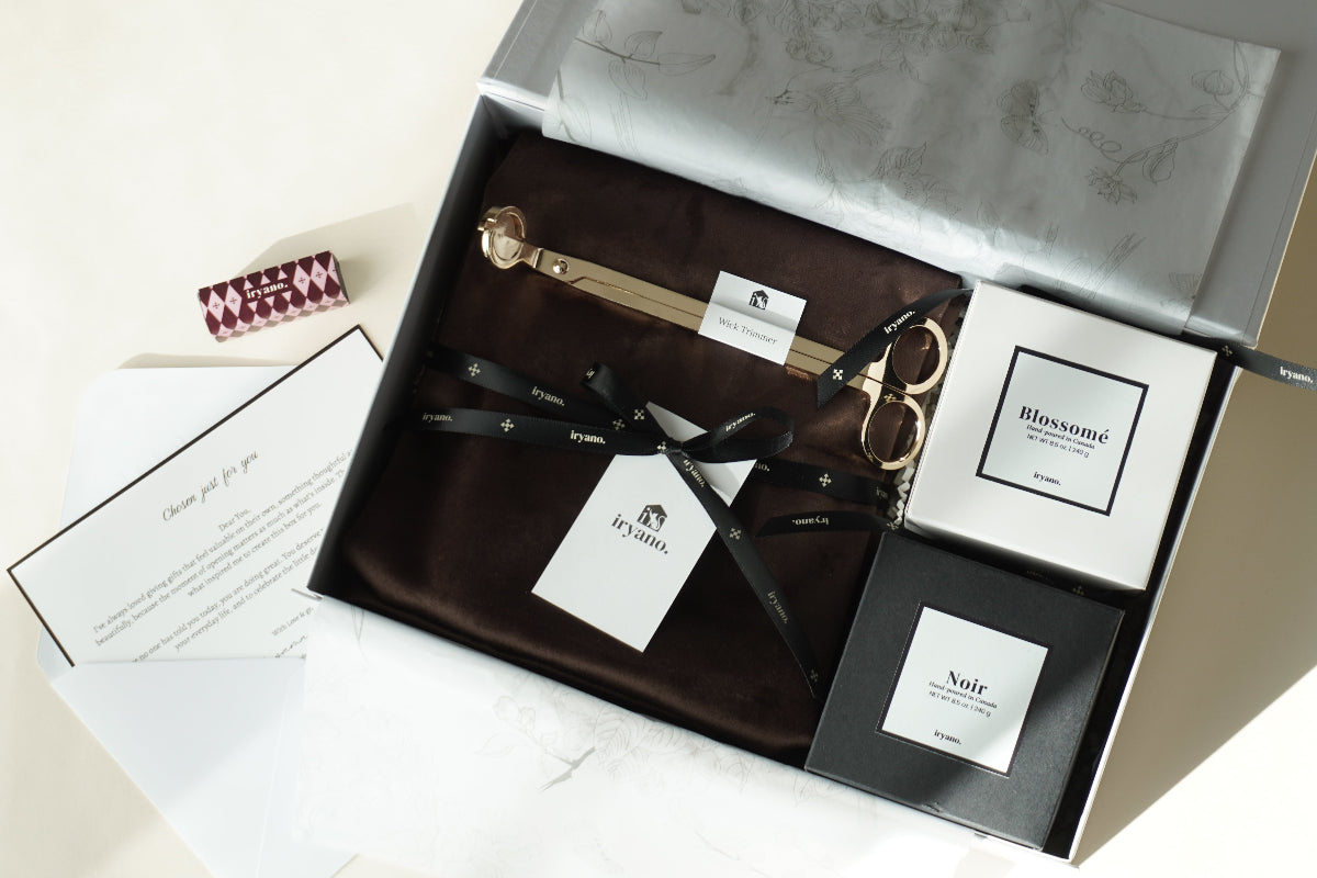 Grooming kit with scissors, comb, and other items in a box on a white surface